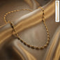 Golden oval beaded chain necklace
